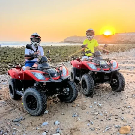 Quad biking at sunset on the beach in Agadir Morocco